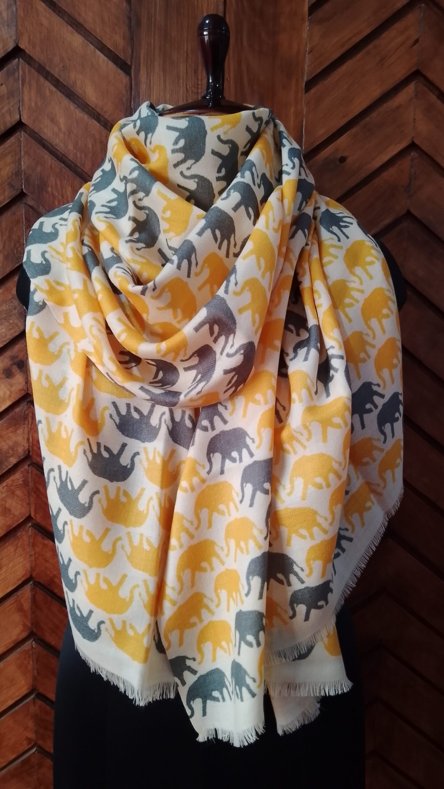 Merino wool stole in digital elephant print in egg yolk yellow and stone grey