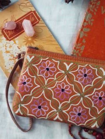 Leather pouch with Aari design