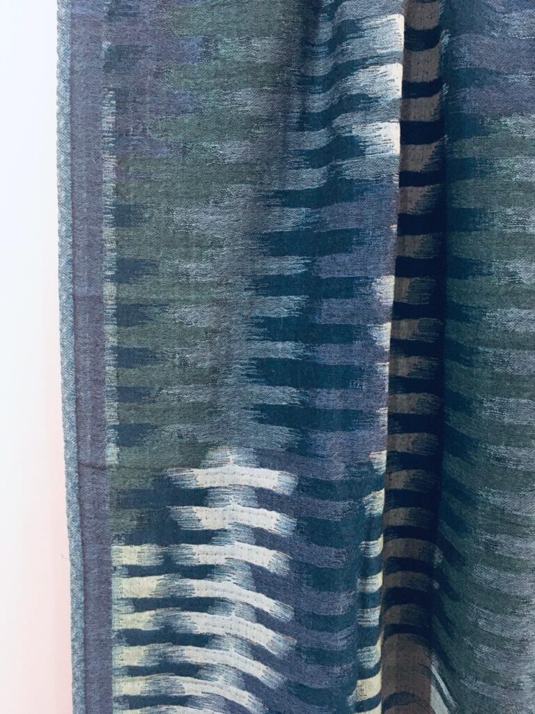 Throw blue in boiled wool with fringes in Ikat design 14